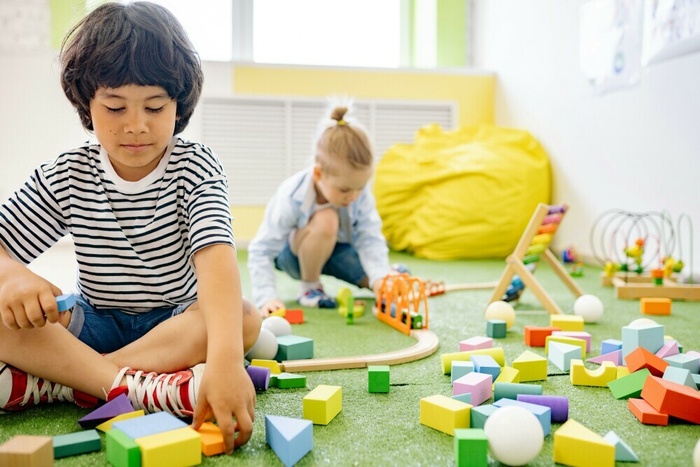 two children playing with toys