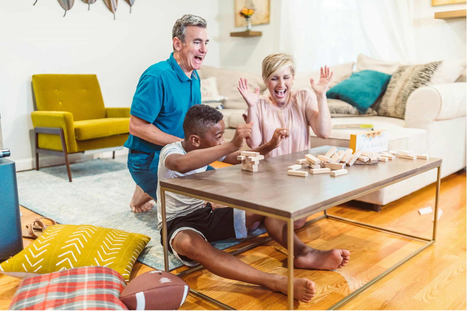 parents with a child learning about choosing the right educational toys for your child