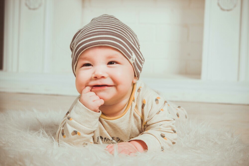 photo of a baby based on eductional toys make learning fun for infants.